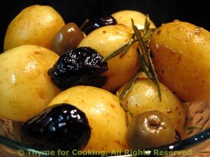 New Potatoes Cooked with Wine and Olives